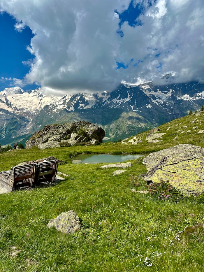Beautiful alpine scene with rocks and lake in Saas-Grund, Switzerland.